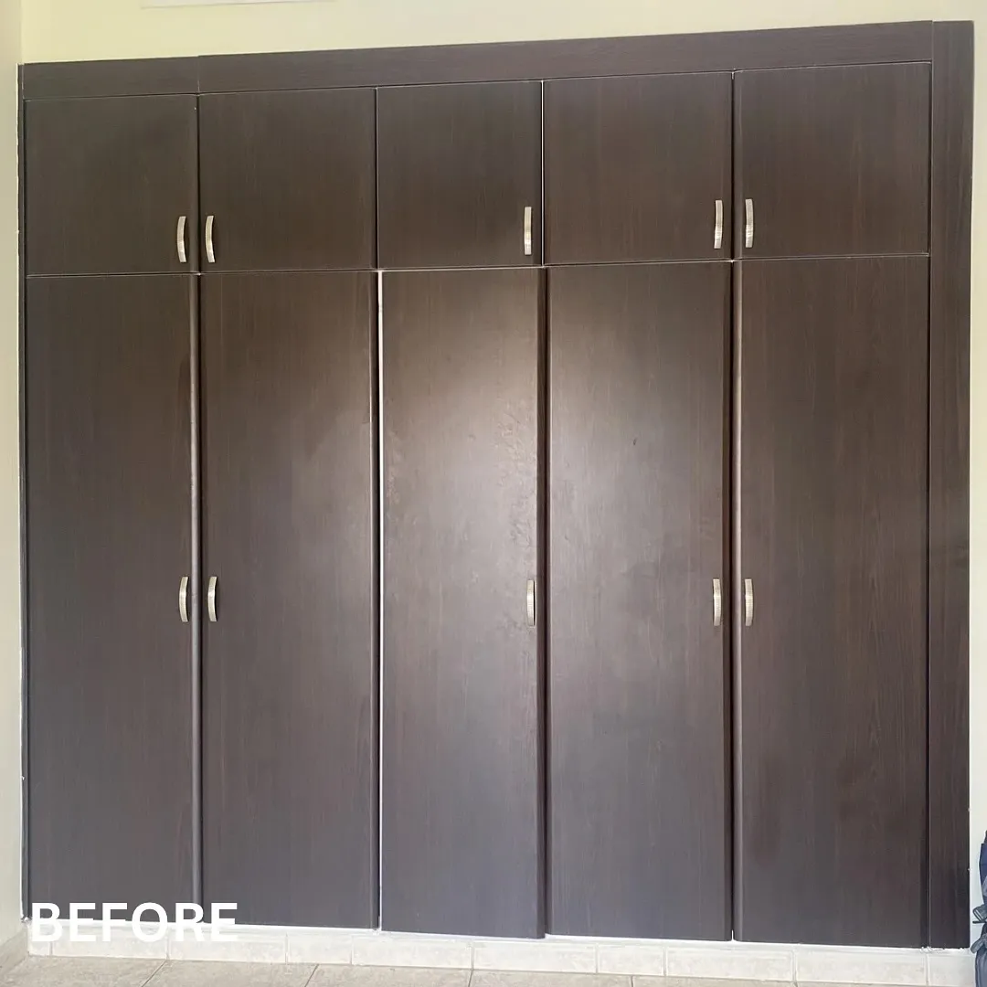 Matte black wardrobe wrap transformation in Dubai — before